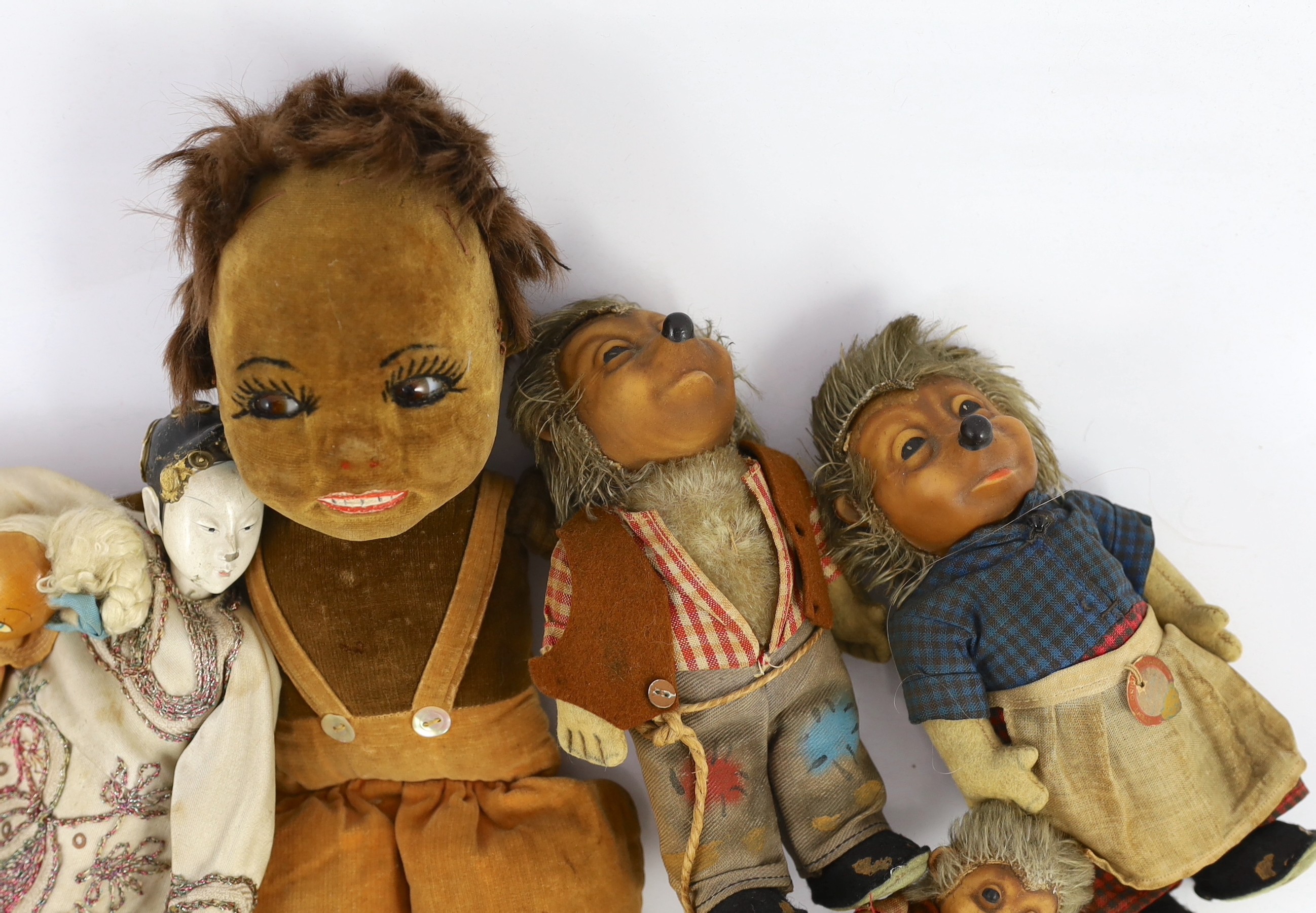 A Norah Wellings-type South Sea Island doll, 13in., three Steiff puppets, Japanese gofun doll, etc.